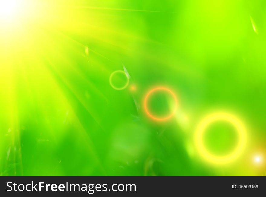 Abstract green background with yellow ray of light. Abstract green background with yellow ray of light.