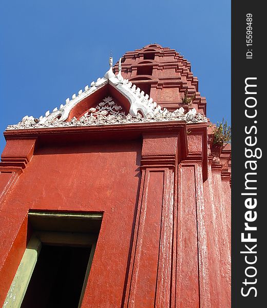 Ancient Big red pagoda and buddha in thai temple