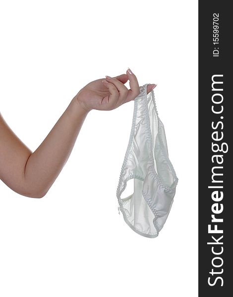 A woman's hand holding an underwear isolated in white background. A woman's hand holding an underwear isolated in white background