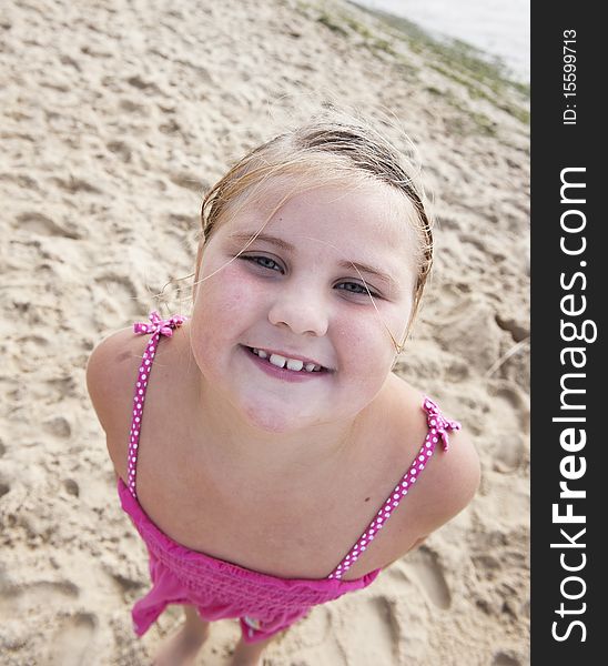 Beauty girl portrait from above perspective on beach