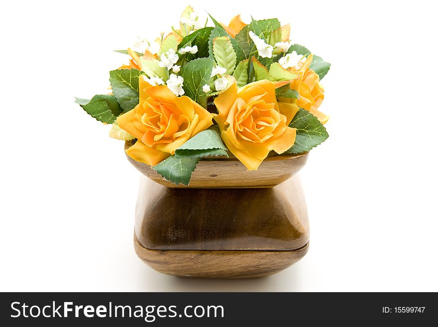 Wood bowl with bunch of flowers