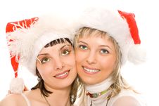 Couple Brunette And Blonde Girl In Santa Caps Royalty Free Stock Image Couple Brunette And Blonde Girl In Santa Caps Royalty Free Stock Image