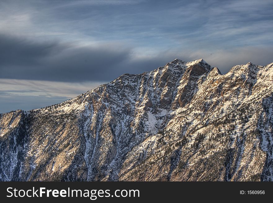 Mountain ridge and clouds upclose