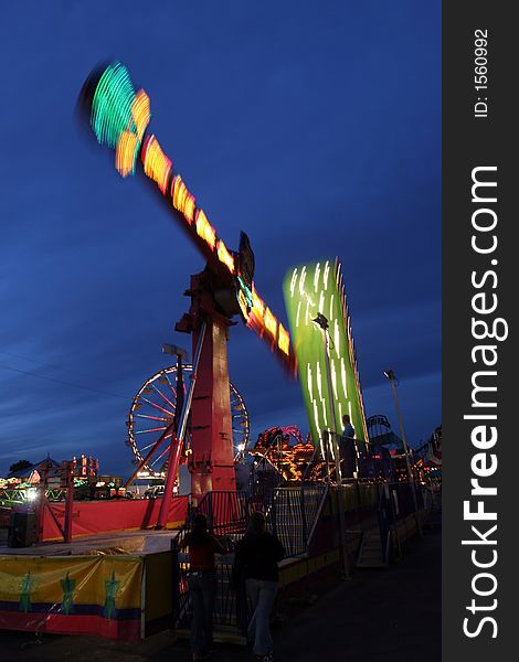 A Fair Ride blurs as the sun sets