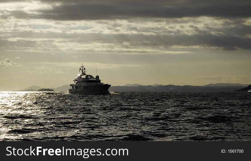 Motor yacht Teddy in late afternoon in an upcoming gale at Cap Ferrat