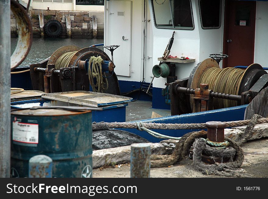 Fishing boat equipment, old rusty boat, ropes