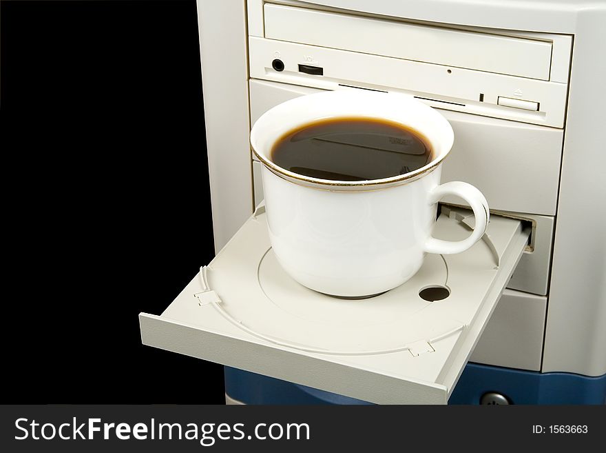 Cup of black coffee on CD-ROM, isolated on black
