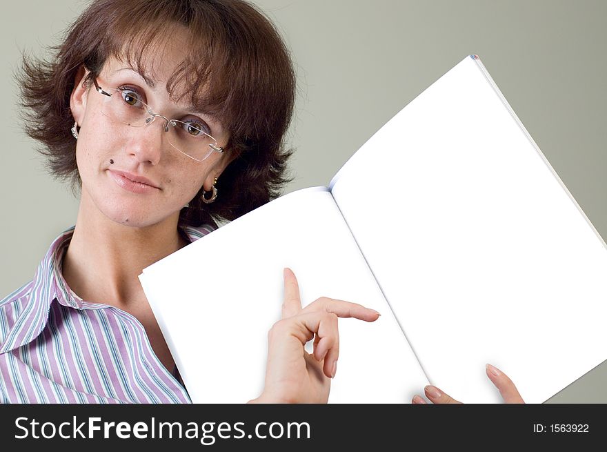 Young woman with open notebook and blank pages. Young woman with open notebook and blank pages