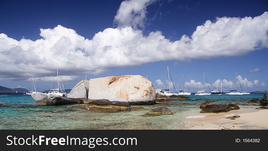 Granite rocks on a tropical beach. Granite rocks on a tropical beach