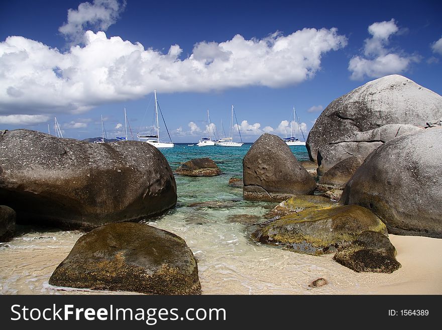 Granite rocks on a tropical beach. Granite rocks on a tropical beach