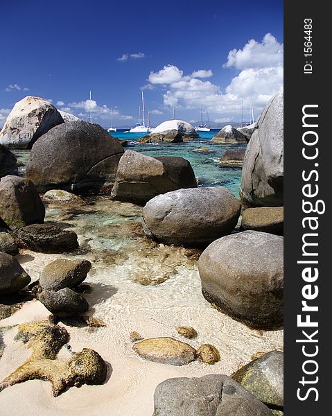 Granite rocks on a tropical beach. Granite rocks on a tropical beach