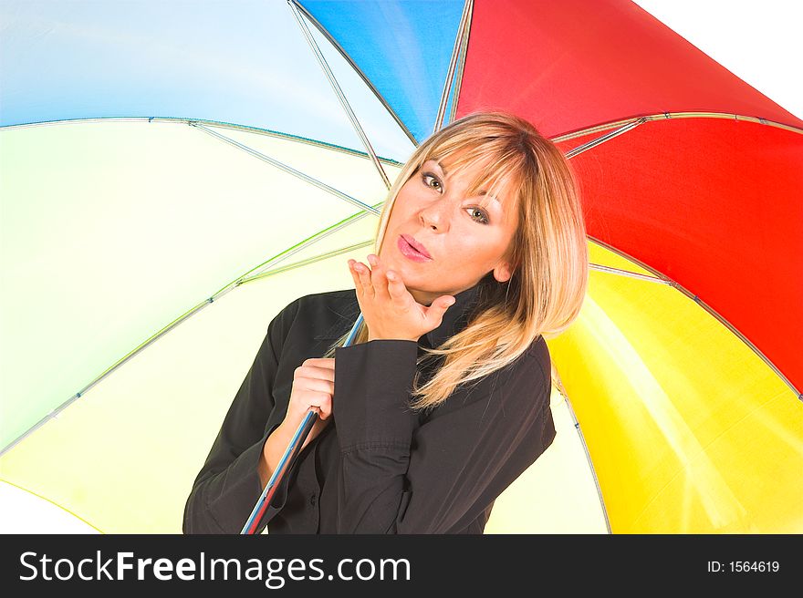 Young girl sending a kiss with umbrella in colors. Young girl sending a kiss with umbrella in colors