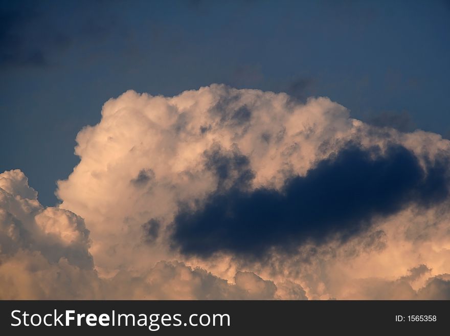 Deep Dark Clouds in the Blue Sky