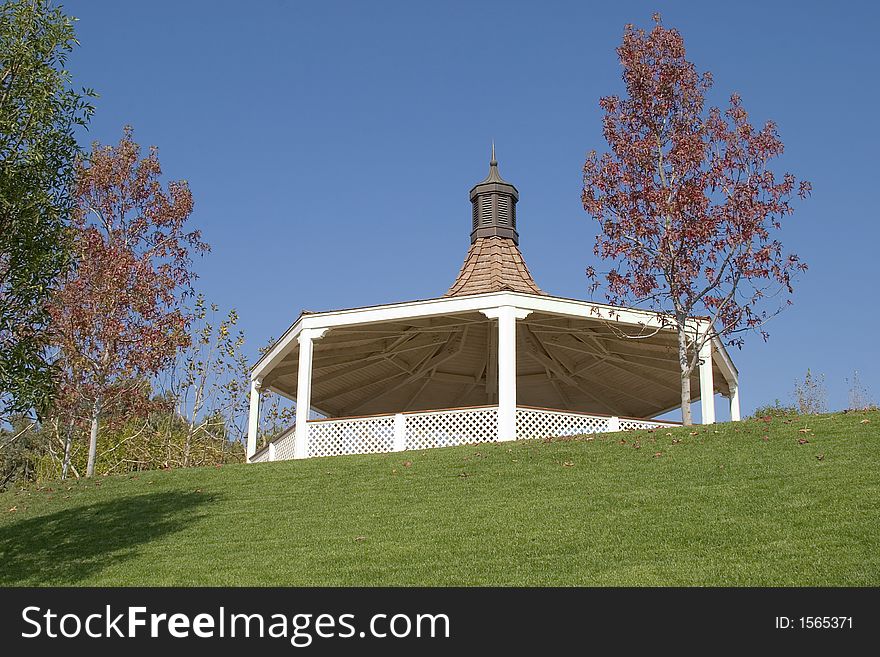 Replica of a Victorian bandstand surrounded by a grassy amphitheater.