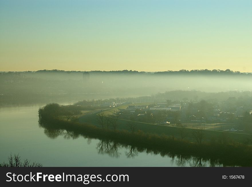 Fog hanging low over the river valley. Fog hanging low over the river valley