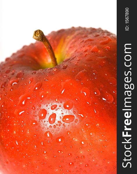 Closeup of apple with water drops on it