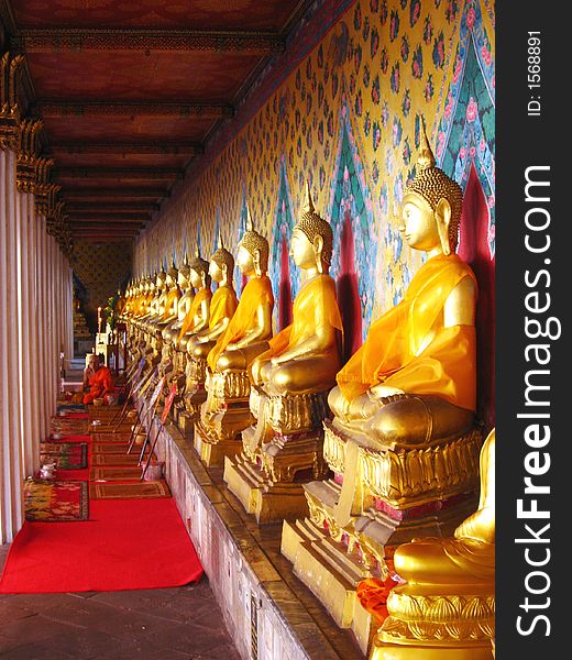 A row of golden buddas