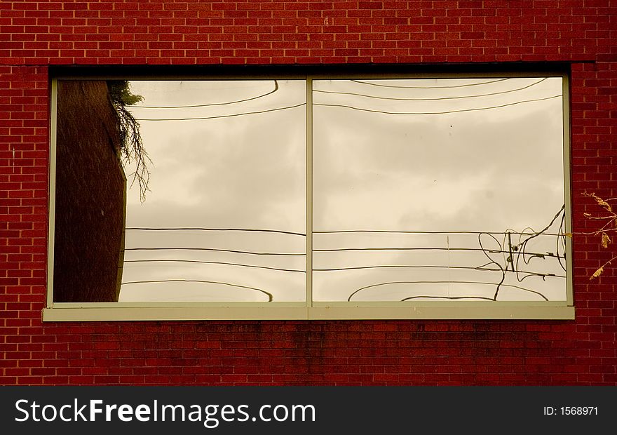 Interesting reflections on the window of an office building. Interesting reflections on the window of an office building.