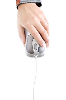 Computer Mouse In Hand Royalty Free Stock Photos