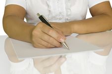 Women Keep Pen And Write On The White Page Stock Photos