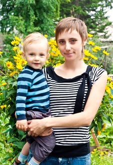 Mother Holding Baby In Her Arms Royalty Free Stock Photos