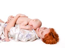 Baby Boy Lying On His Mother Stock Photos
