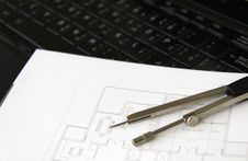Architectural Plan And Laptop Stock Photo