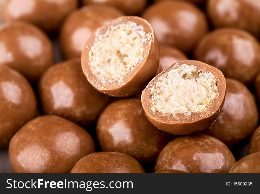 Chocolate balls and halves with crisp filling