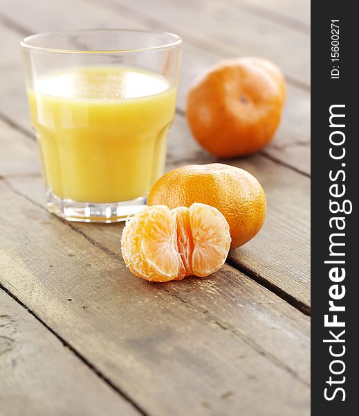 Mandarin and glass of juice