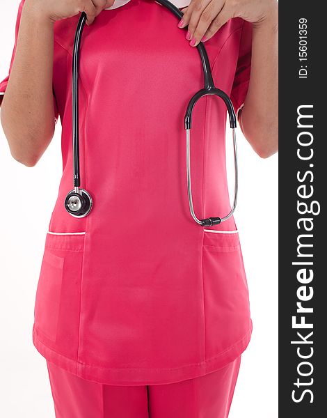 A female nurse holding stethoscope. A female nurse holding stethoscope