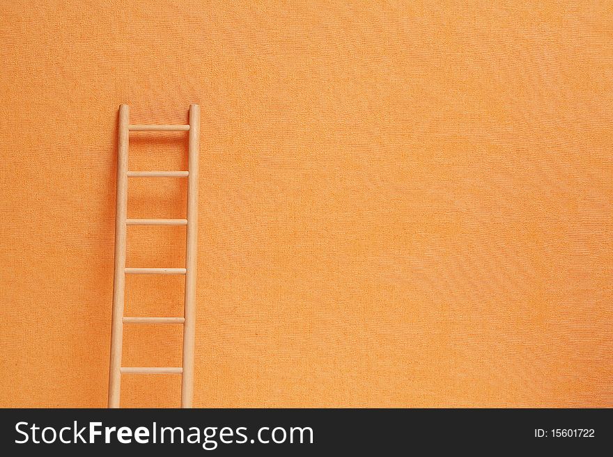 Conceptual background with wooden ladder against ginger wall. Conceptual background with wooden ladder against ginger wall