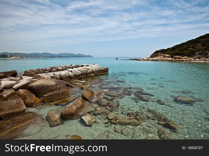 An old wharf for the transportation of building stones, Sardinia, Italy. An old wharf for the transportation of building stones, Sardinia, Italy