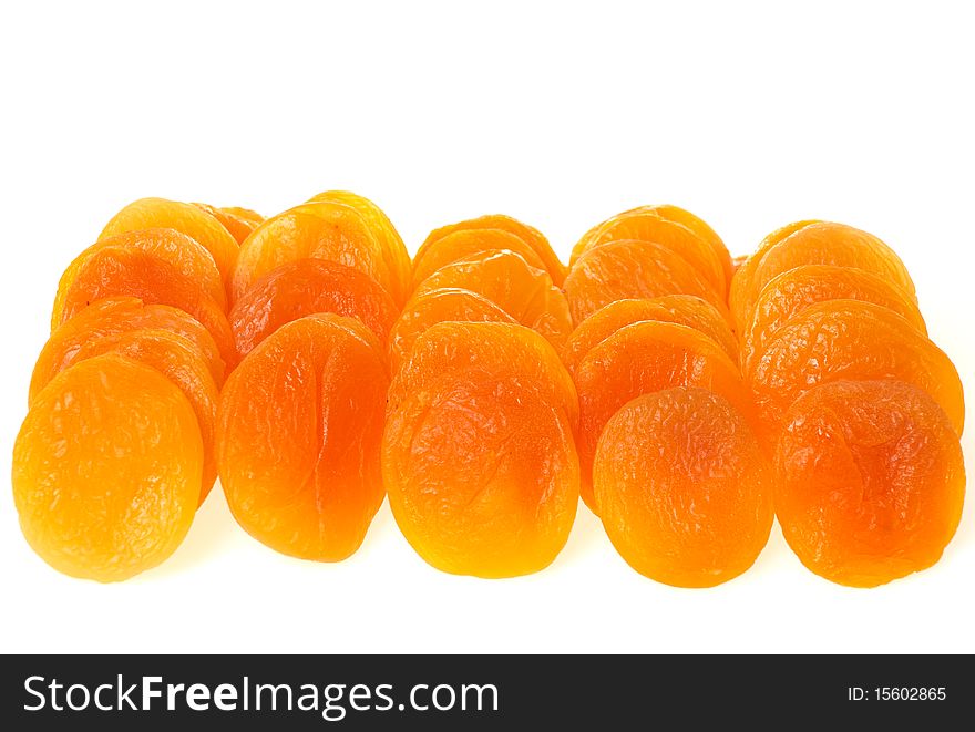 Dried apricots isolated on white