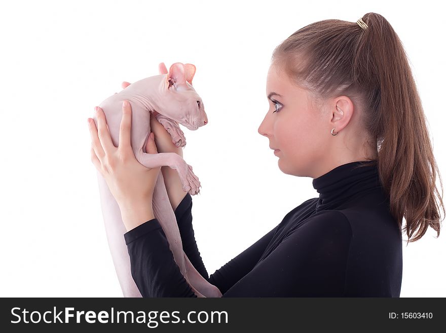 Beautiful young woman with a cat on a white background