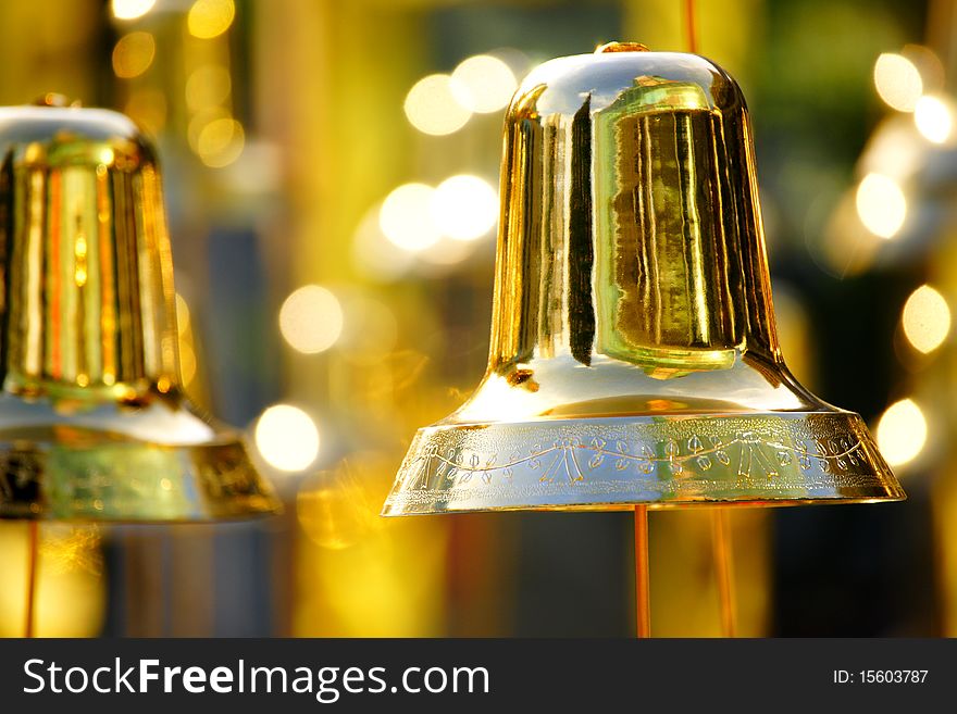 Many golden bells will bring you cheer and happiness for Christmas and New Year