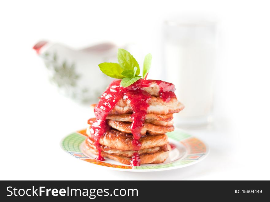 Pancakes With Rasberry Sauce. Sauceboat And Milk