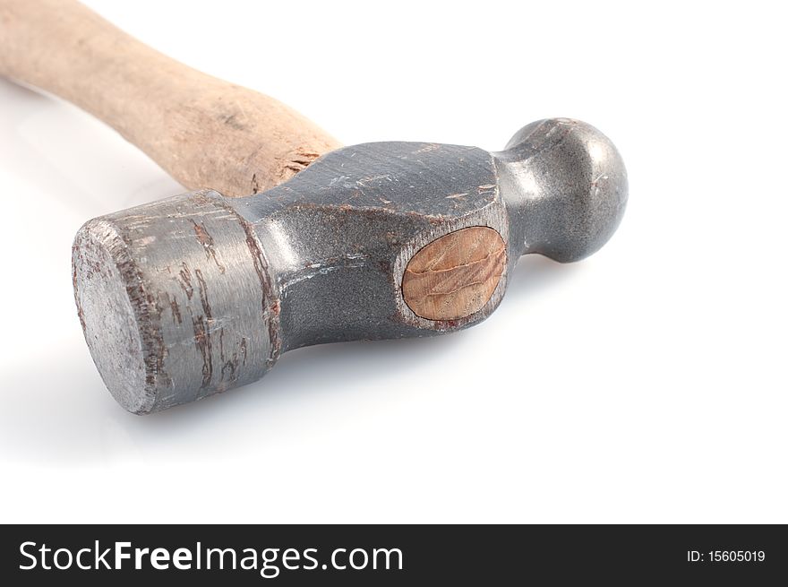 A wooden handle hammer, isolated on white.