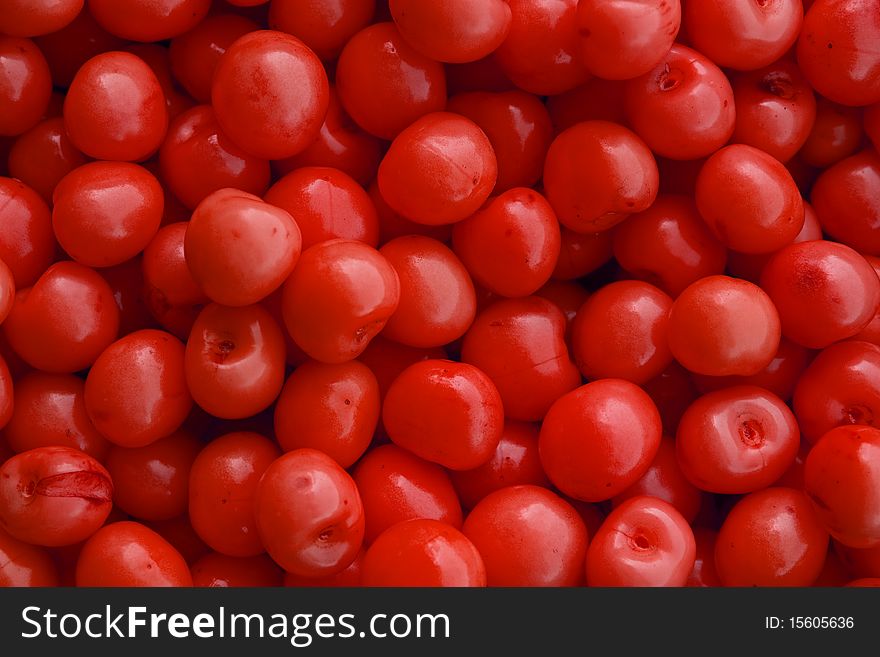 Many red fresh cherries background