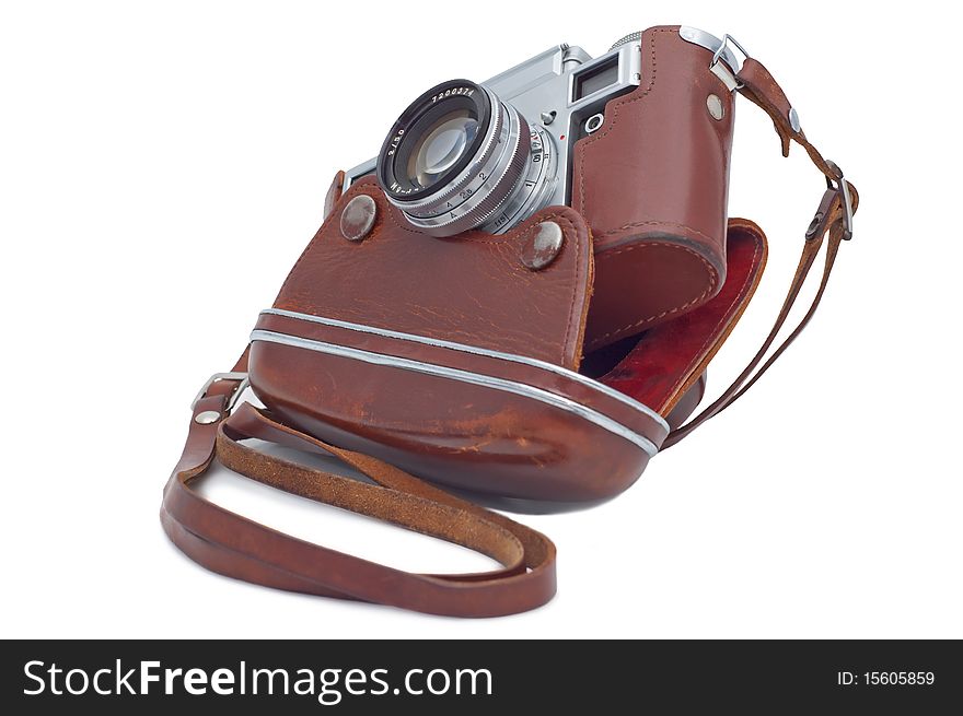 Old camera in cover isolated on white. Old camera in cover isolated on white.