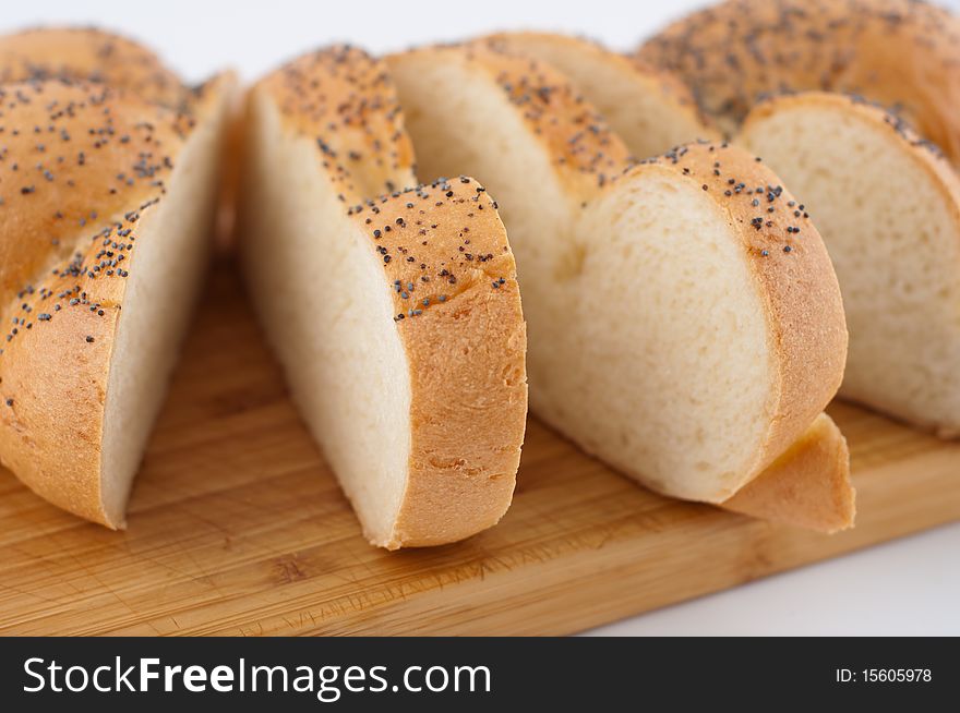 Bread slices on board close up. Bread slices on board close up.