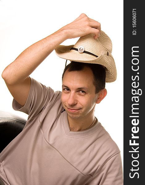 The Man Puts On A Straw Hat A Head