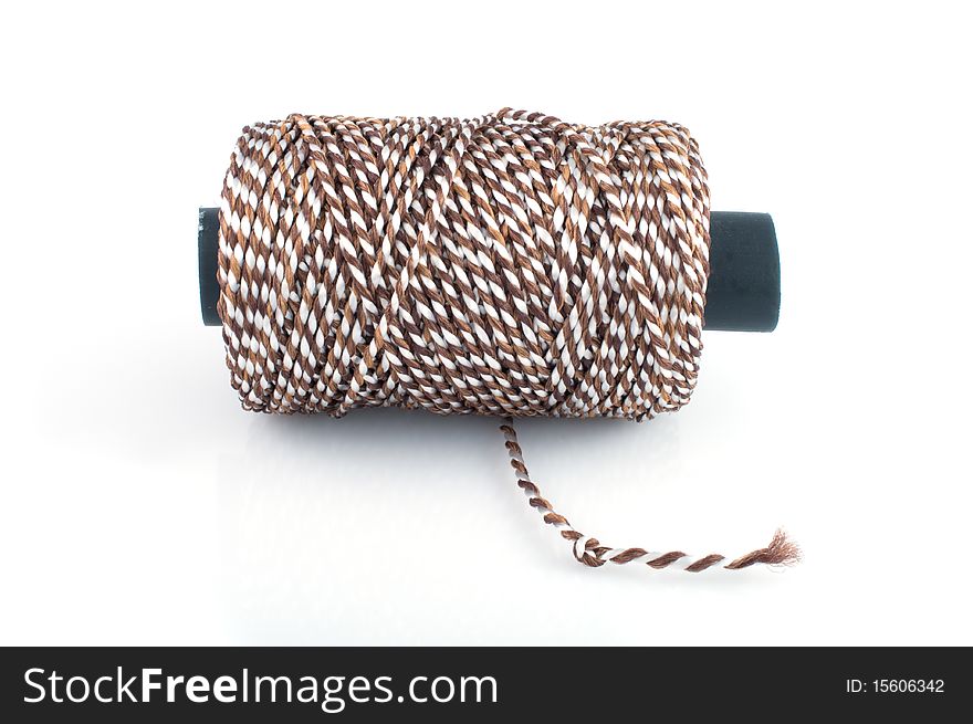 Clew of twine isolated on white background