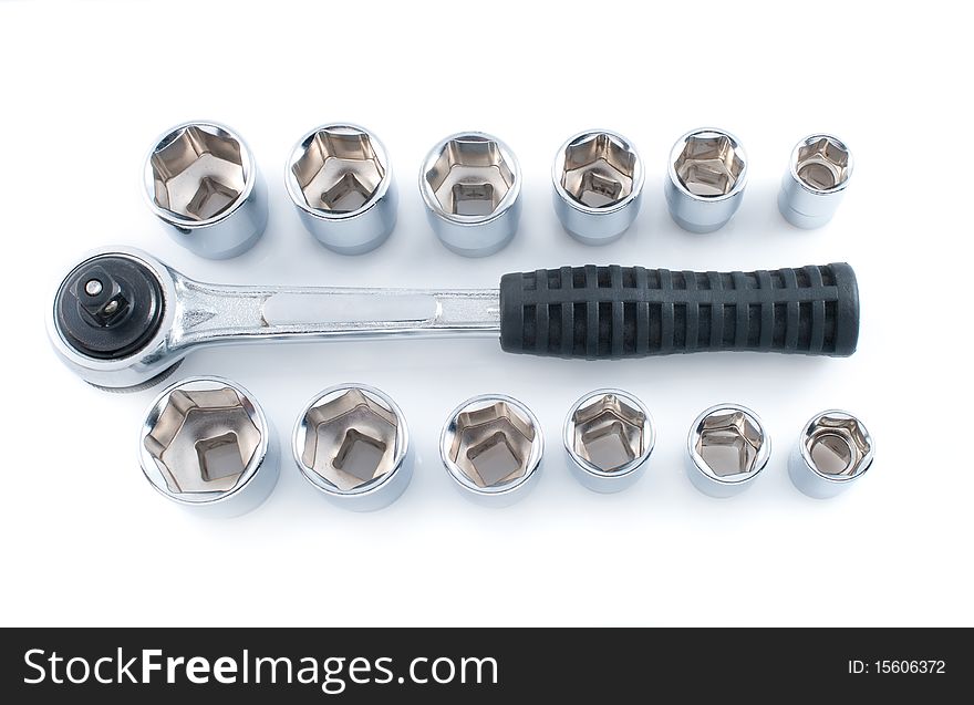 Set of chromeplated wrenches, on a white background