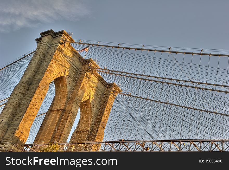 The Brooklyn bridge photograped at sunrise. This is an HDR composite of three exposures