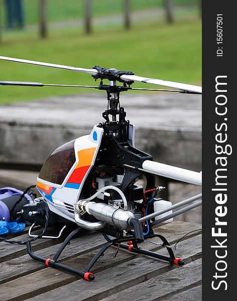 An image of a radio controlled helicopter showing the cockpit and engine detail