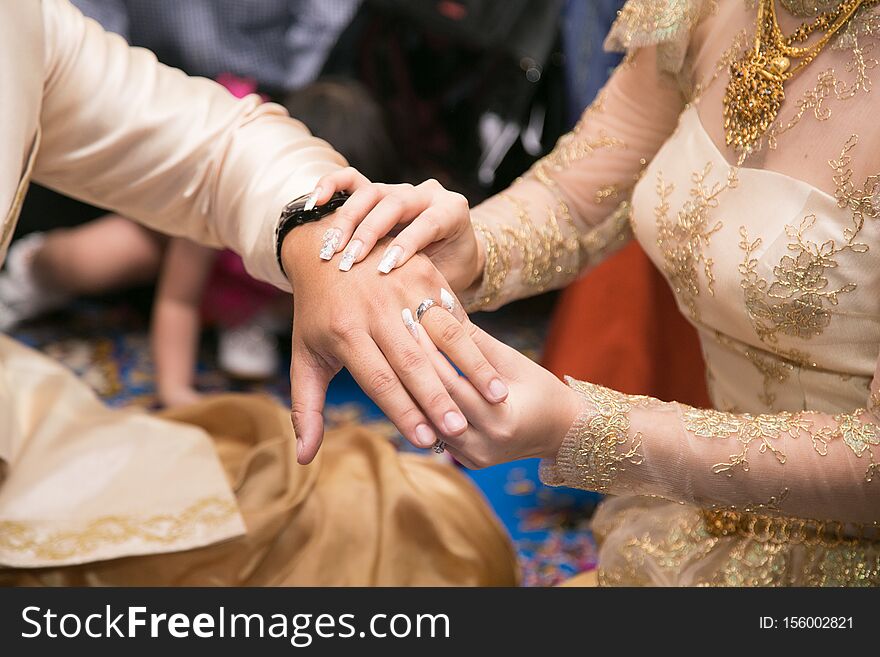 Wedding ring,groom and bride hand in wedding ceremony 1