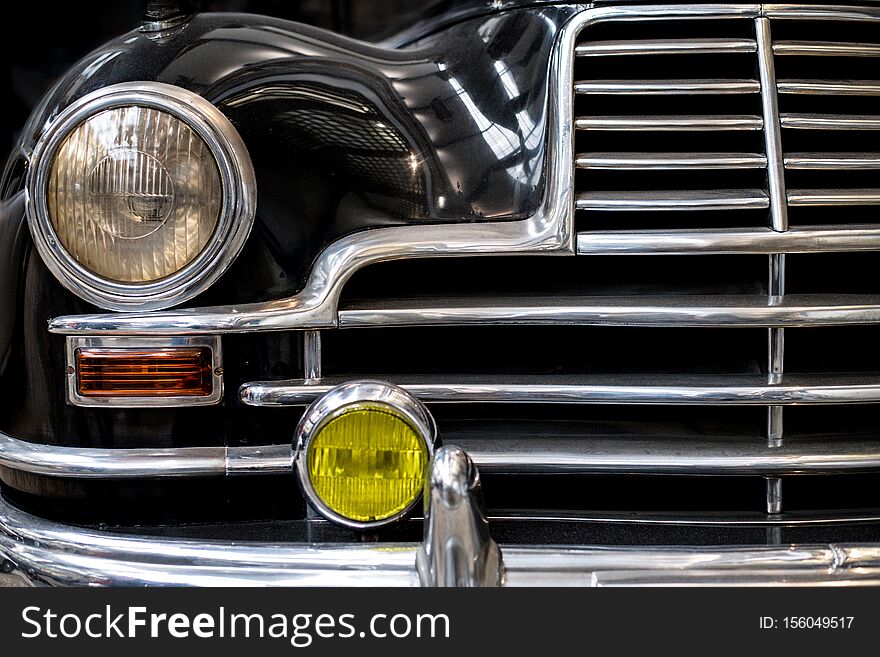 Vintage car - old car - detail on the headlight