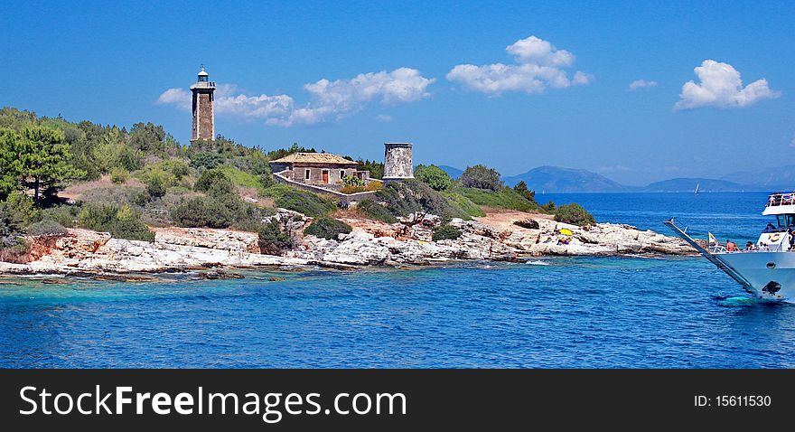 Lighthouse at coast in greek island