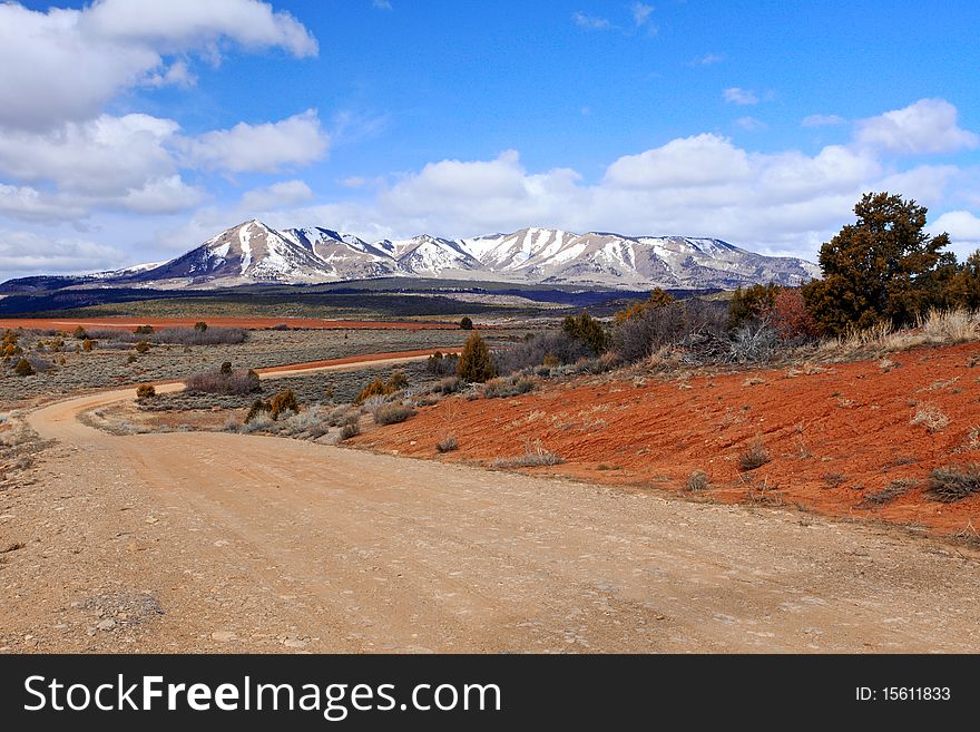 Country road with beautiful landscapes on background,Utah,USA