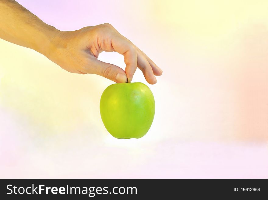A Green Apple Is Against Colour Backgrou